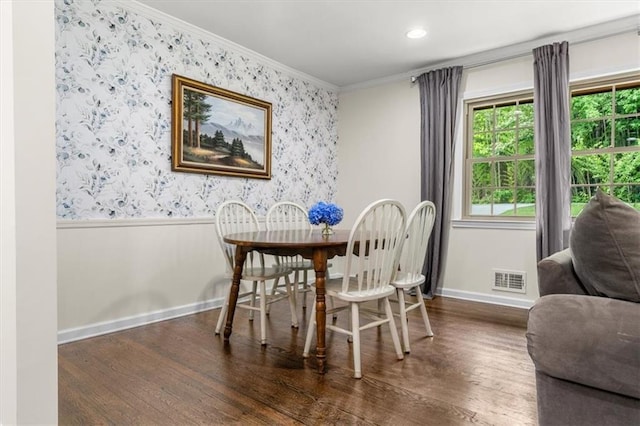 1630 Park Ln, Marietta, GA 30066 - dining space featuring baseboards, wood finished floors, ornamental molding, wallpapered walls, and wainscoting