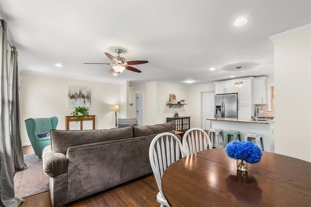 1630 Park Ln, Marietta, GA 30066 - dining room featuring ceiling fan, dark wood-style floors, crown molding, and recessed lighting
