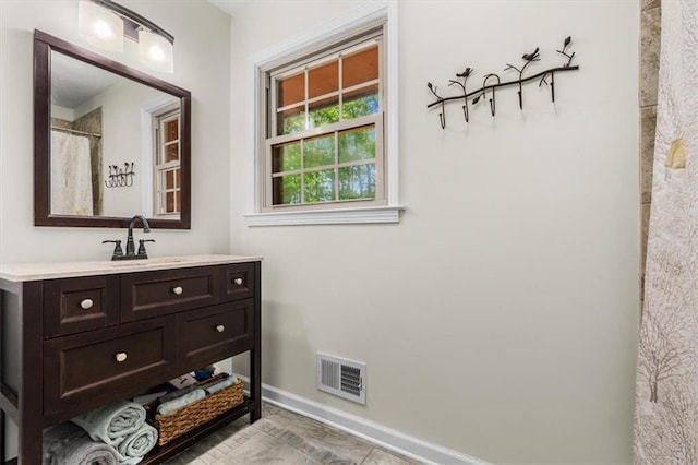 1630 Park Ln, Marietta, GA 30066 - bathroom with vanity and baseboards