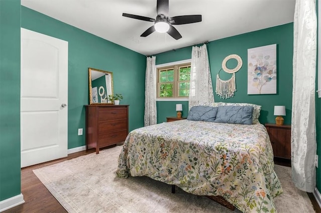 1630 Park Ln, Marietta, GA 30066 - bedroom featuring baseboards, wood finished floors, and a ceiling fan