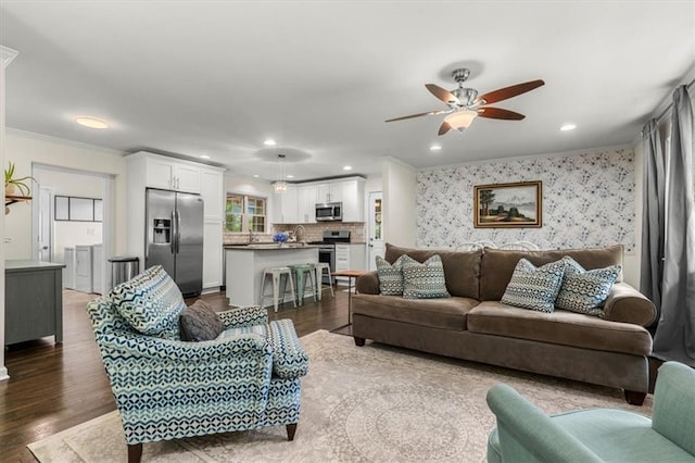 1630 Park Ln, Marietta, GA 30066 - living area with a ceiling fan, wood finished floors, crown molding, and recessed lighting