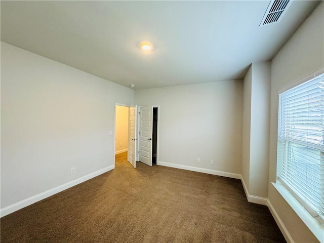 empty room featuring carpet