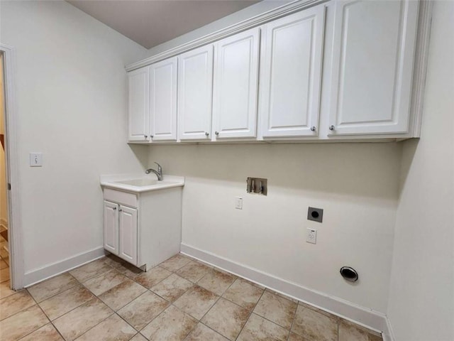 laundry room featuring cabinet space, baseboards, hookup for a washing machine, hookup for an electric dryer, and a sink