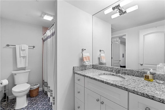 full bath featuring toilet, baseboards, and vanity