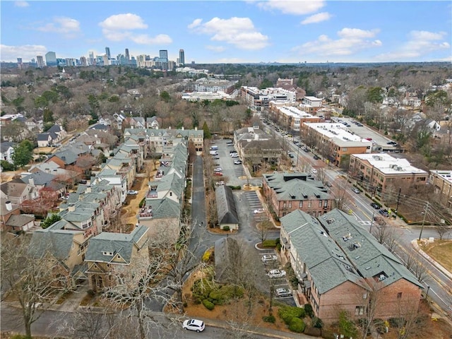 birds eye view of property with a city view