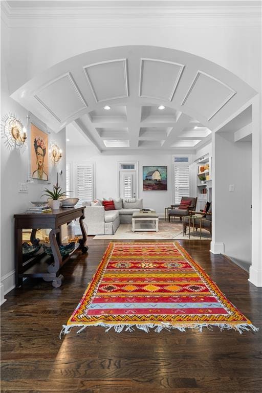 interior space with recessed lighting, beam ceiling, coffered ceiling, and wood finished floors