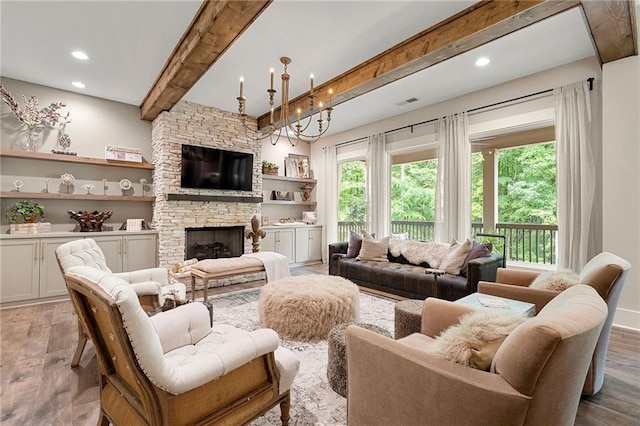 131 Forsyth Park Ln, Woodstock, GA 30188 - living area featuring wood finished floors, beam ceiling, a fireplace, and recessed lighting