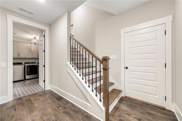 131 Forsyth Park Ln, Woodstock, GA 30188 - stairs featuring washing machine and clothes dryer, wood finished floors, and baseboards