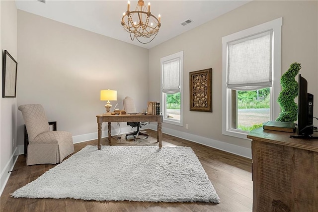 131 Forsyth Park Ln, Woodstock, GA 30188 - office area with baseboards, a chandelier, and wood finished floors