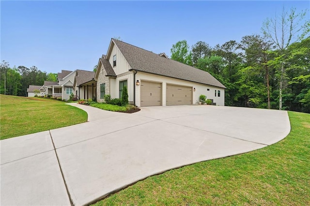 131 Forsyth Park Ln, Woodstock, GA 30188 - view of side of property featuring a garage, concrete driveway, board and batten siding, and a lawn