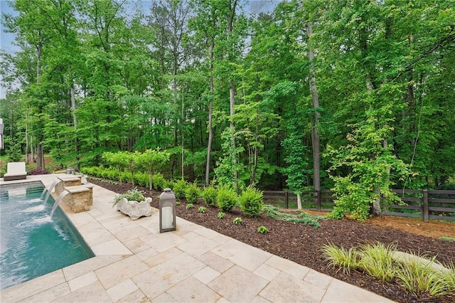 131 Forsyth Park Ln, Woodstock, GA 30188 - view of patio with an outdoor pool