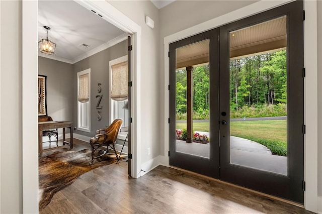 131 Forsyth Park Ln, Woodstock, GA 30188 - entryway with french doors, crown molding, dark wood-type flooring, baseboards, and a chandelier