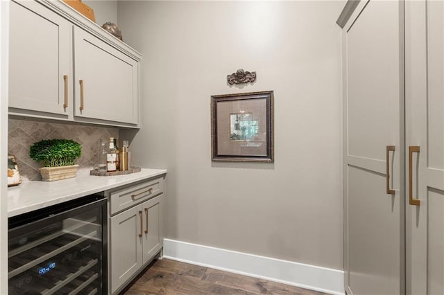 131 Forsyth Park Ln, Woodstock, GA 30188 - indoor dry bar featuring beverage cooler, decorative backsplash, baseboards, and dark wood-style floors