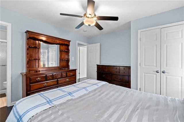 bedroom featuring ceiling fan, connected bathroom, and a closet