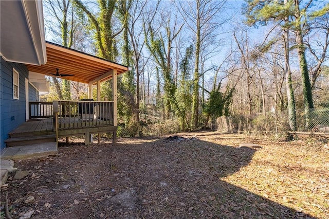 view of yard with a wooden deck