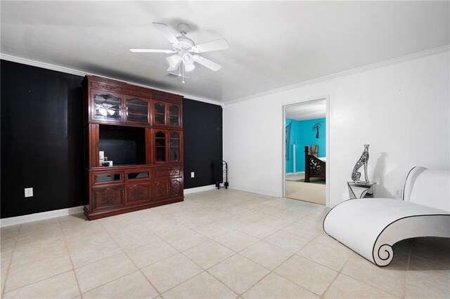 living room with ceiling fan, ornamental molding, light tile patterned floors, and baseboards