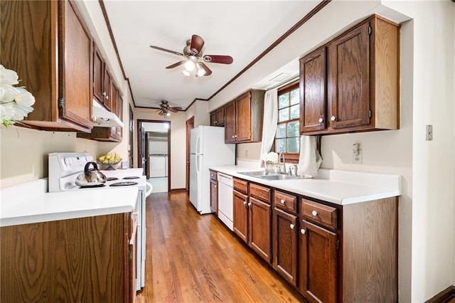 4140 Westchester Xing NE, Roswell, GA 30075 - kitchen with light wood-type flooring, white appliances, light countertops, a ceiling fan, and a sink
