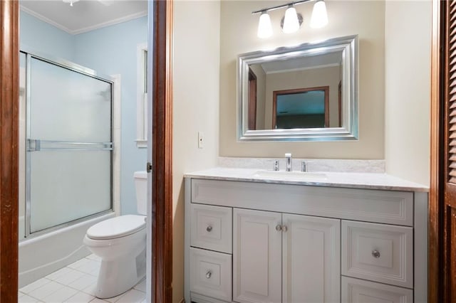 4140 Westchester Xing NE, Roswell, GA 30075 - bathroom with combined bath / shower with glass door, ornamental molding, toilet, vanity, and tile patterned floors