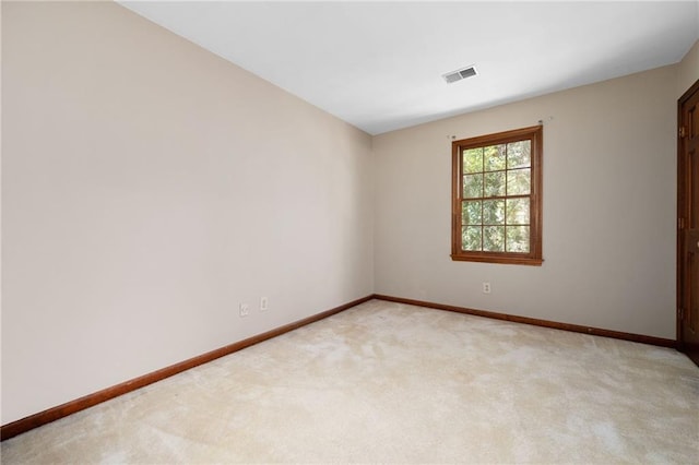4140 Westchester Xing NE, Roswell, GA 30075 - unfurnished room with visible vents, baseboards, and light colored carpet