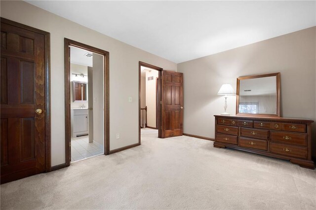 4140 Westchester Xing NE, Roswell, GA 30075 - bedroom with light colored carpet, baseboards, and ensuite bathroom