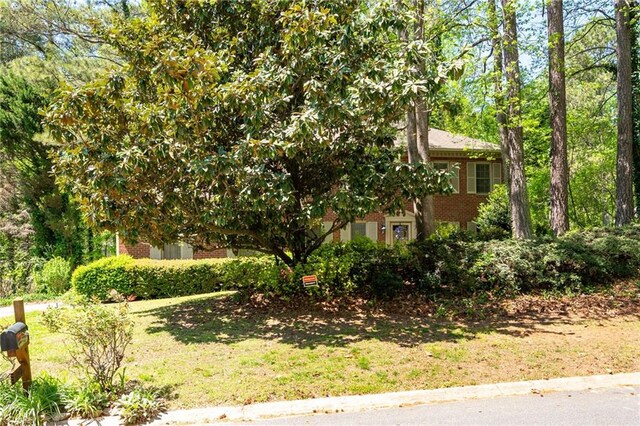4140 Westchester Xing NE, Roswell, GA 30075 - exterior space with brick siding and a lawn