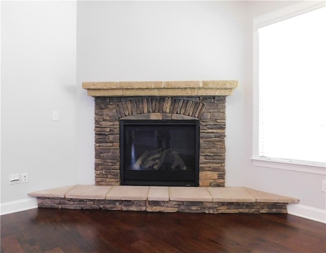 330 La Perla Dr, Sugar Hill, GA 30518 - detailed view of wood finished floors and a fireplace