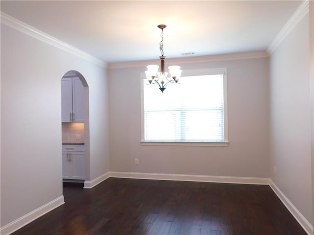 330 La Perla Dr, Sugar Hill, GA 30518 - empty room featuring arched walkways, dark wood-style floors, a chandelier, and crown molding