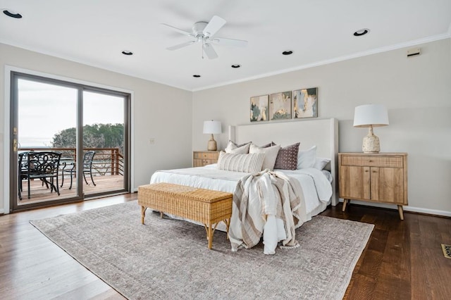 bedroom with dark wood-style flooring, ornamental molding, baseboards, and access to outside