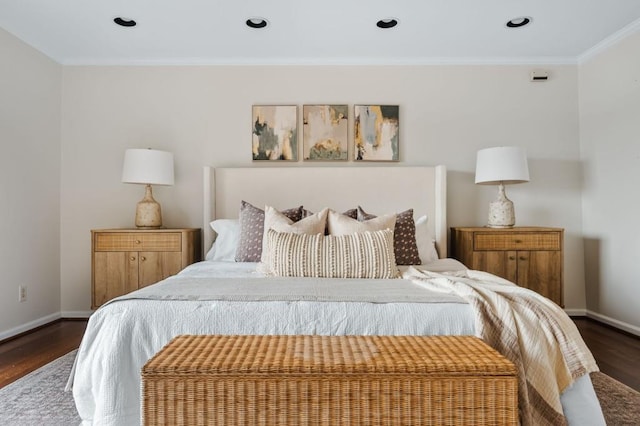 bedroom featuring crown molding, baseboards, dark wood-type flooring, and recessed lighting