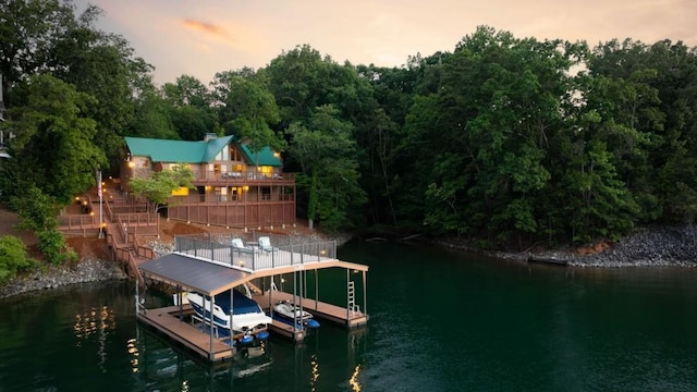 dock area featuring a water view and boat lift