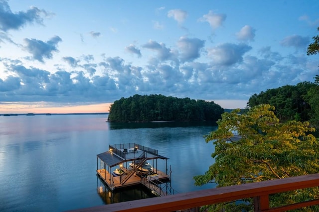 view of dock with a water view and boat lift