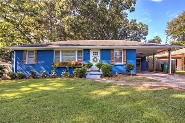 854 Parkway Dr SE, Smyrna, GA 30080 - ranch-style home with concrete driveway, an attached carport, and brick siding