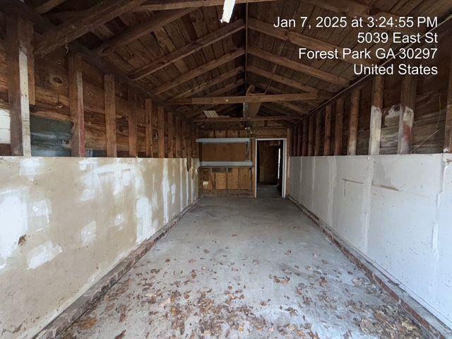 misc room with lofted ceiling