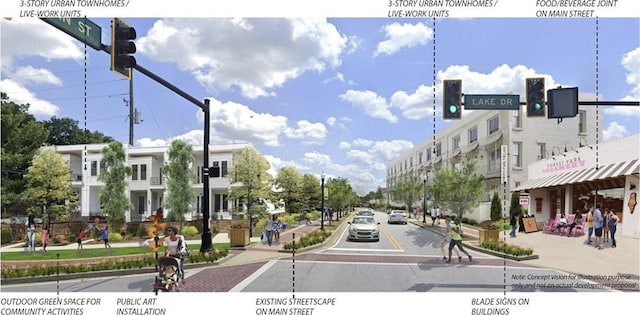 view of street with sidewalks, traffic lights, traffic signs, and curbs