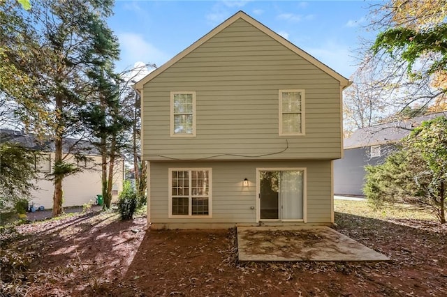 back of property featuring a patio area