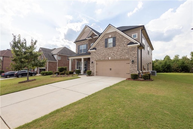 craftsman house with central AC, a front yard, and a garage