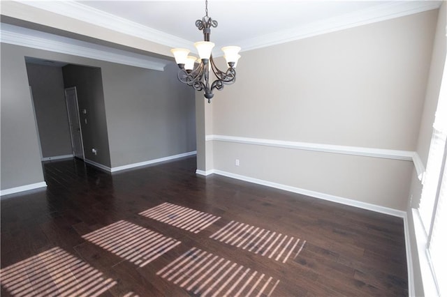 unfurnished dining area with dark hardwood / wood-style flooring, a chandelier, and crown molding