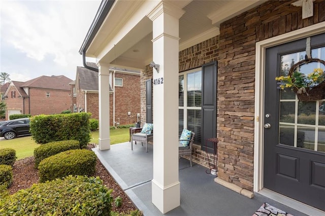 doorway to property featuring a porch