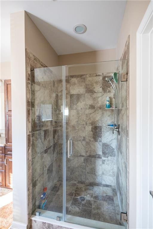 bathroom with an enclosed shower