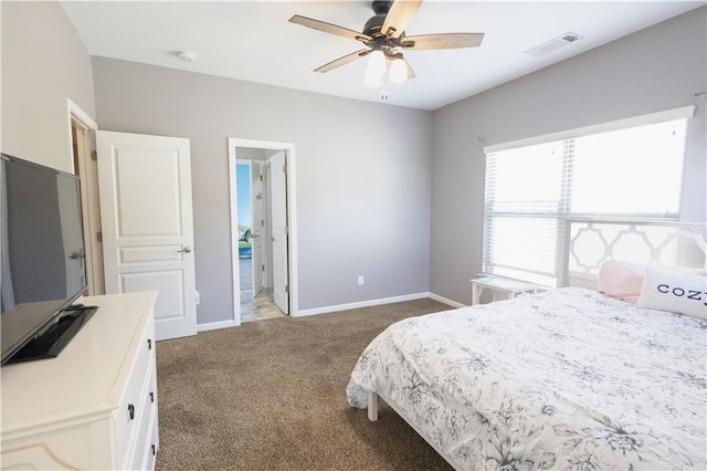 bedroom with ceiling fan and carpet