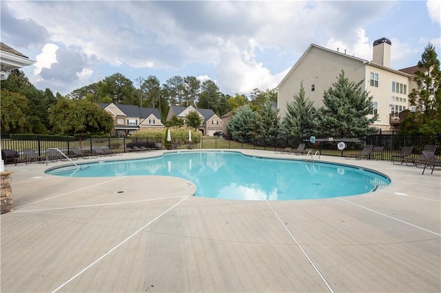 view of pool featuring a patio area