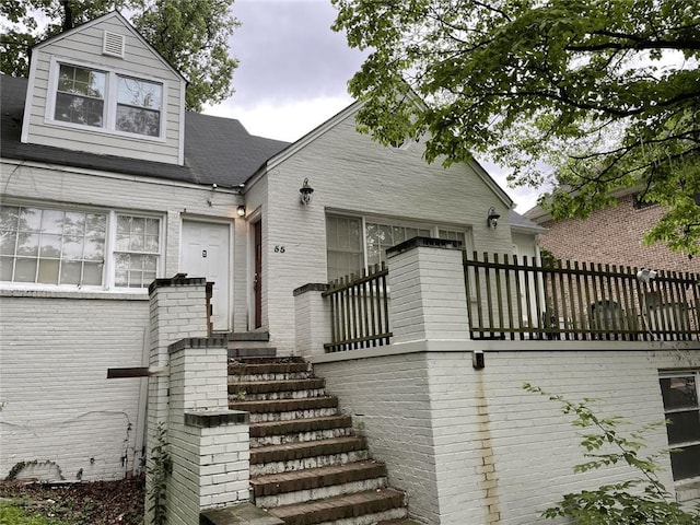 back of property with brick siding