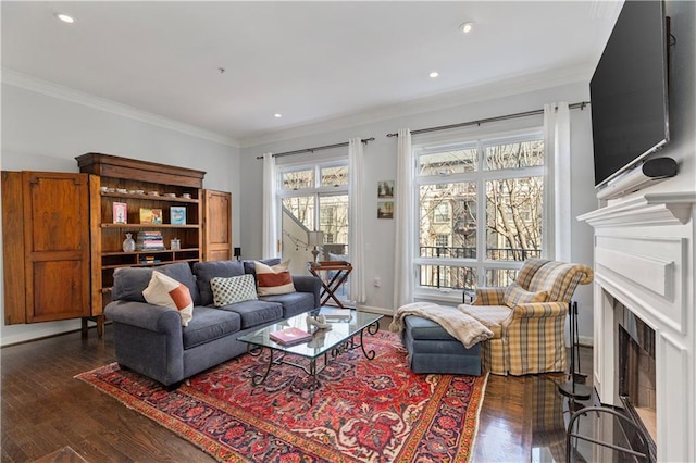 3475 Oak Valley Rd Unit 130, Atlanta, GA 30326 - living room featuring a fireplace with flush hearth, crown molding, dark wood-type flooring, and recessed lighting