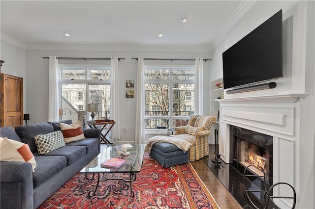 3475 Oak Valley Rd Unit 130, Atlanta, GA 30326 - living room with a fireplace, crown molding, dark wood-style floors, and recessed lighting