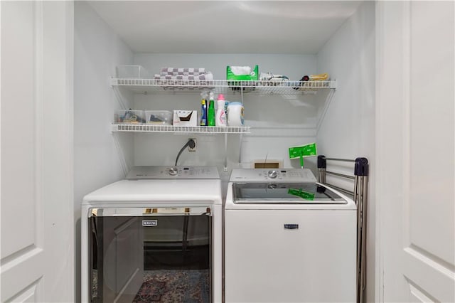 3475 Oak Valley Rd Unit 130, Atlanta, GA 30326 - washroom with washer and clothes dryer and laundry area