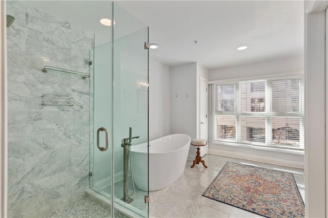 3475 Oak Valley Rd Unit 130, Atlanta, GA 30326 - full bathroom with a freestanding bath, a shower stall, marble finish floor, and recessed lighting