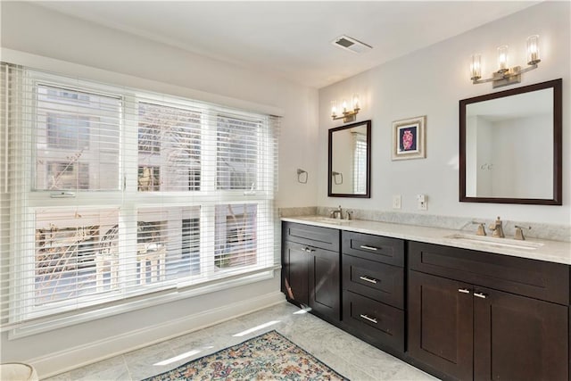3475 Oak Valley Rd Unit 130, Atlanta, GA 30326 - full bath featuring baseboards, a sink, visible vents, and double vanity
