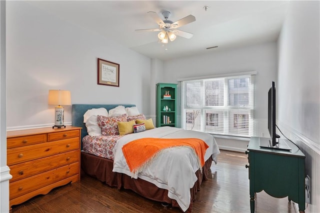3475 Oak Valley Rd Unit 130, Atlanta, GA 30326 - bedroom featuring ceiling fan, wood finished floors, and visible vents