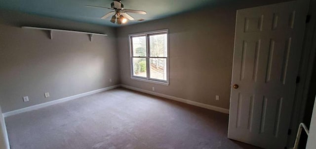 unfurnished bedroom featuring ceiling fan, carpet flooring, and baseboards