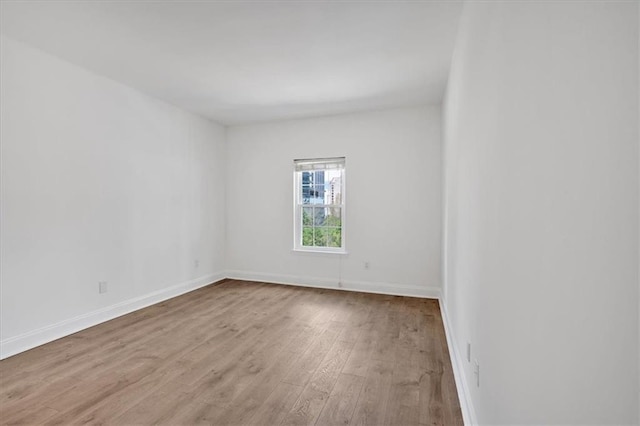 1075 Peachtree Walk NE Unit A421, Atlanta, GA 30309 - unfurnished room with wood finished floors and baseboards